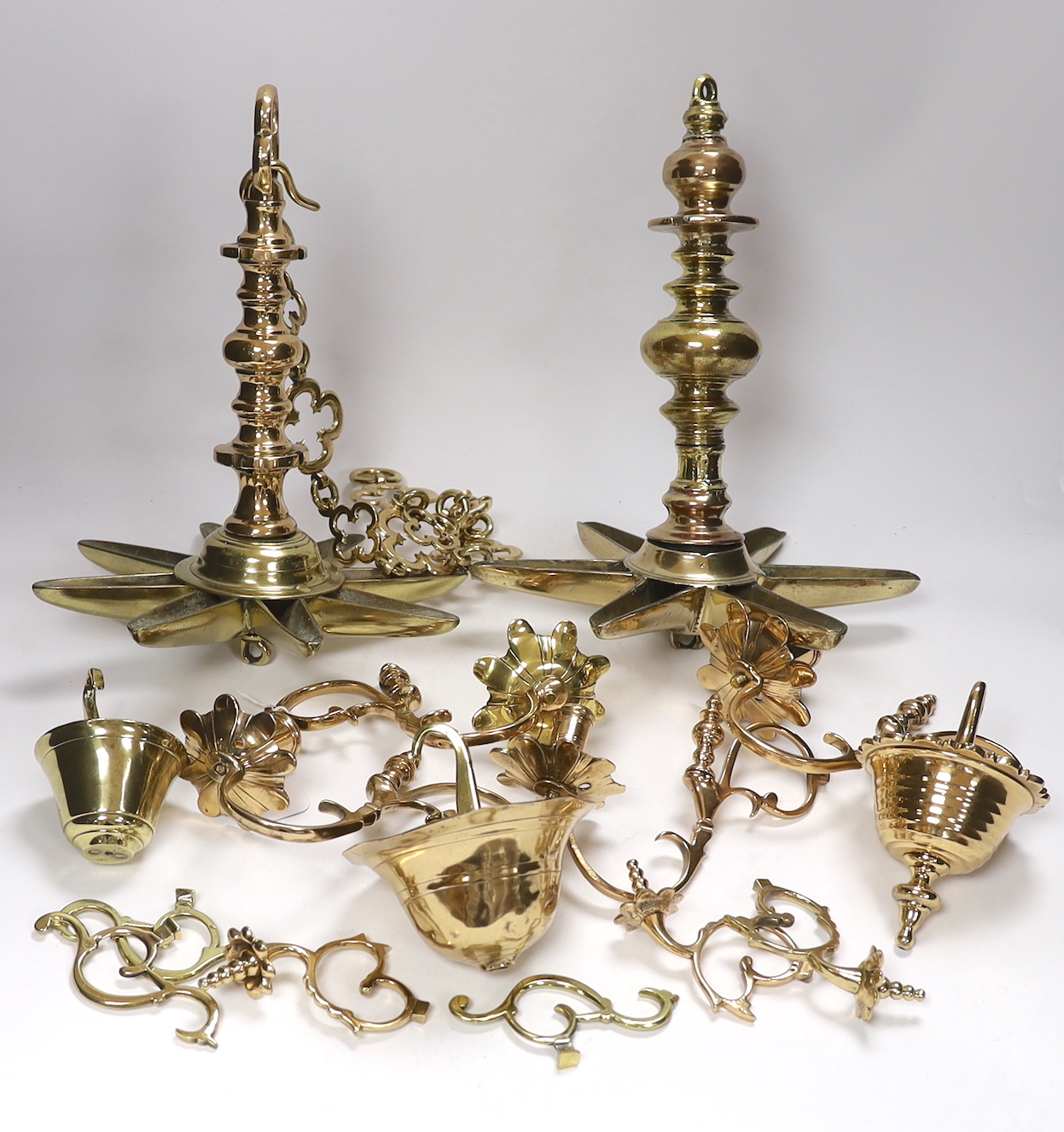 Judaica - two brass Sabbath lamps, one including chain (2), tallest (including chain) 95cm long, and associated arms etc.